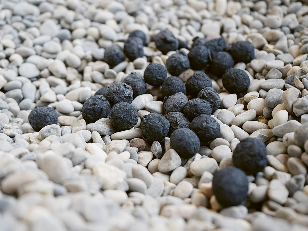 20 Volumenprozent Kohlenstoff-Pellets (schwarz) resultieren in Netto-Null-Emissionen. (Quelle: Empa)